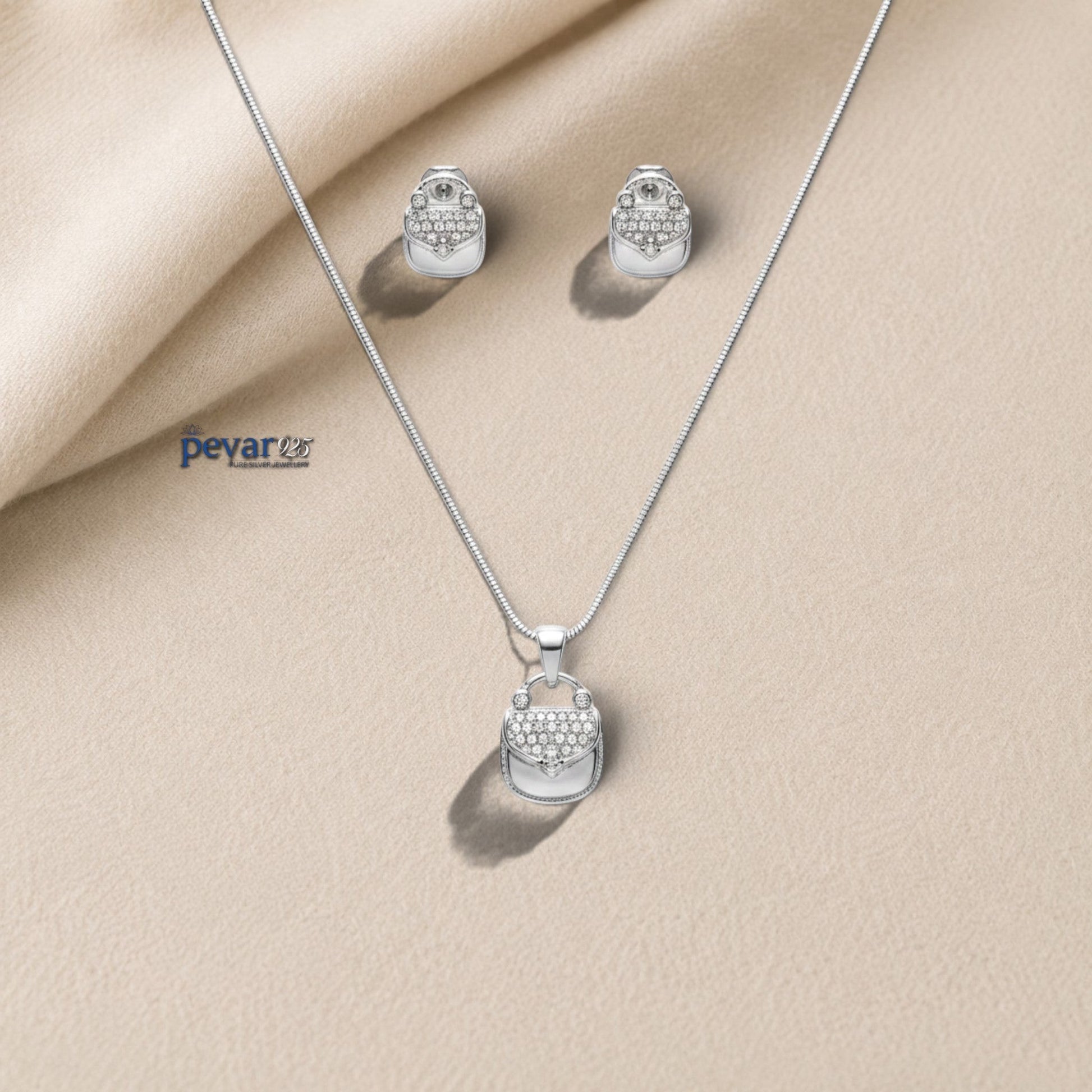 pevar925 sterling silver purse pendant necklace and matching stud earrings set with rhodium plating and clear stones