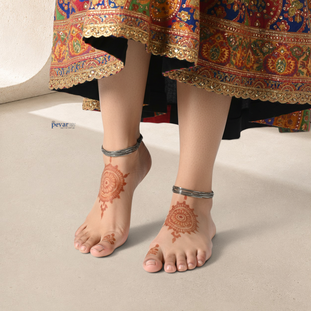 pevar925 sterling silver twisted rope chain anklets worn on feet with henna designs and a traditional skirt