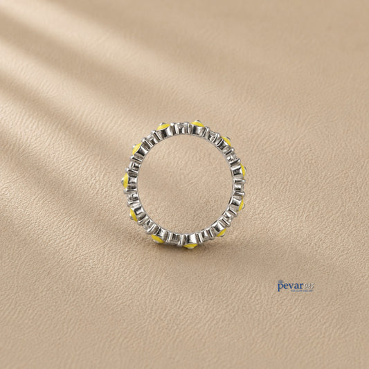 pevar925 sterling silver band ring featuring a continuous row of yellow and black evil eye motifs on rhodium plating.