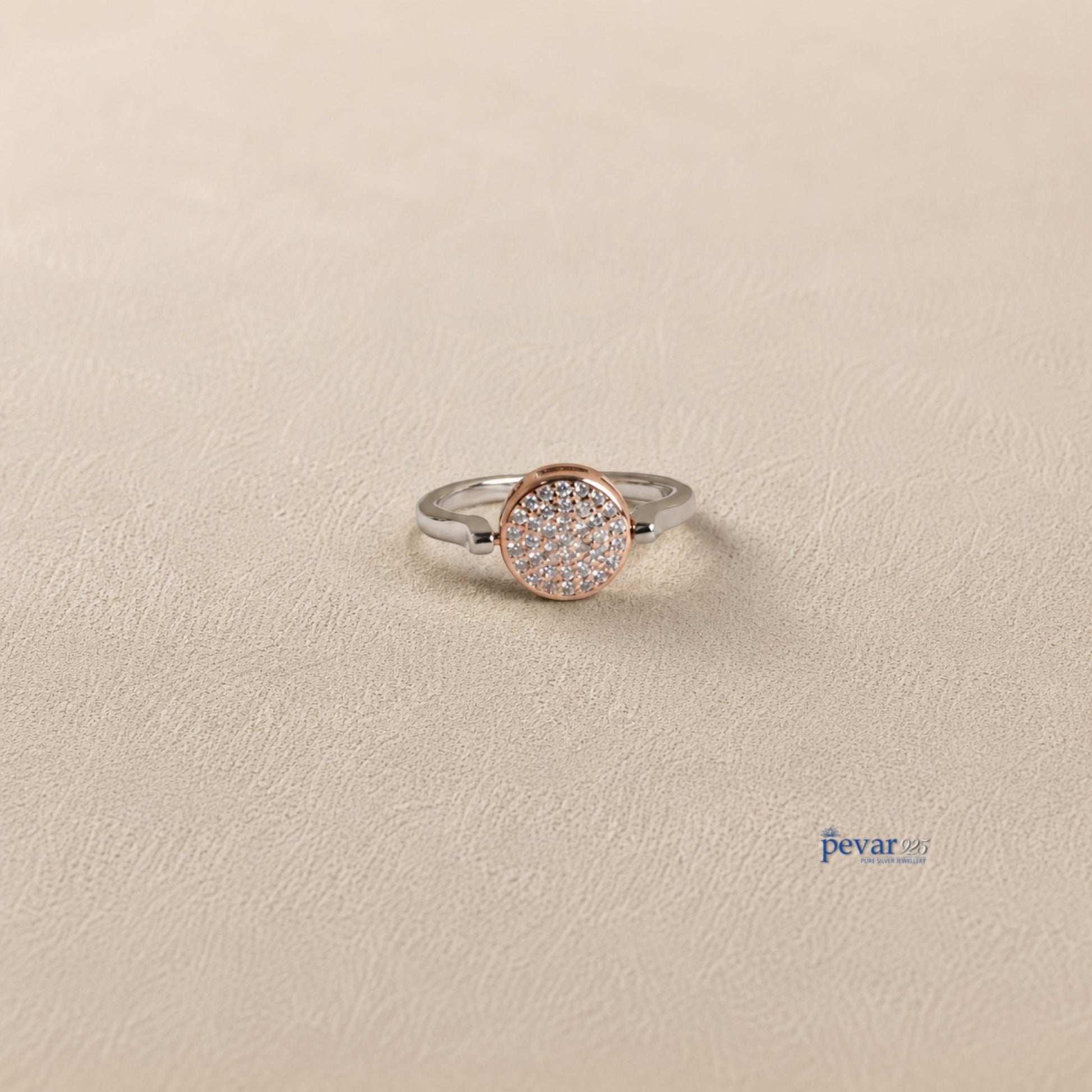 pevar925 sterling silver dual tone flip ring with a circular top featuring sparkling zircon stones